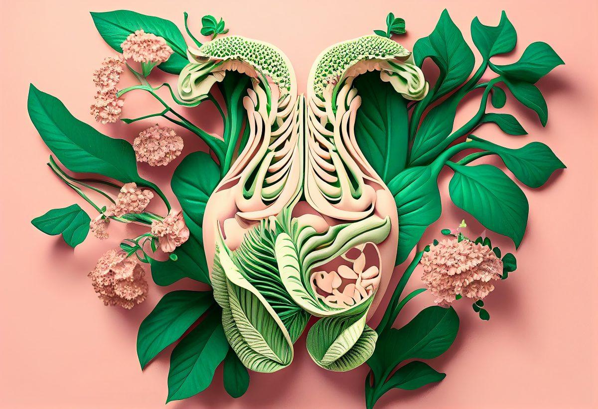 Leaves And Flowers Arranged In Shape Of Female Uterus On Pink Background.